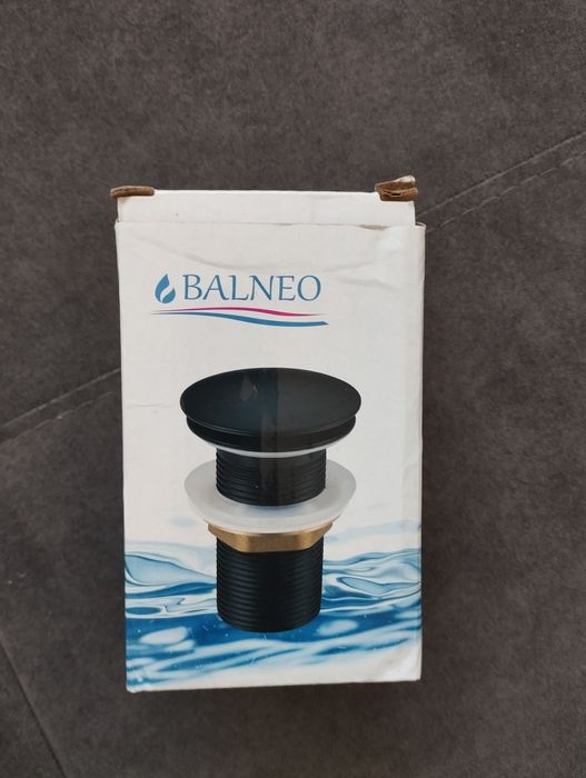 Korek umywalkowy z przelewem