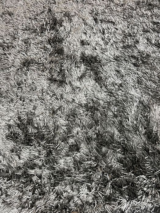 Tapete cinzento felpudo