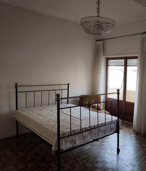 Cama antiga de ferro