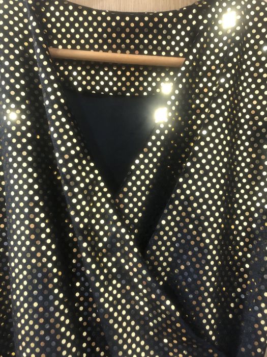 Blusa dourada de brilho