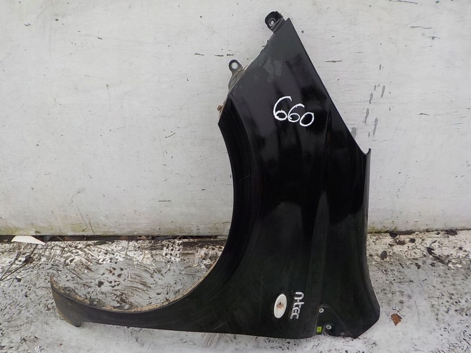 660 NISSAN NOTE I E11 BŁOTNIK LEWY PRZÓD PRZEDNI