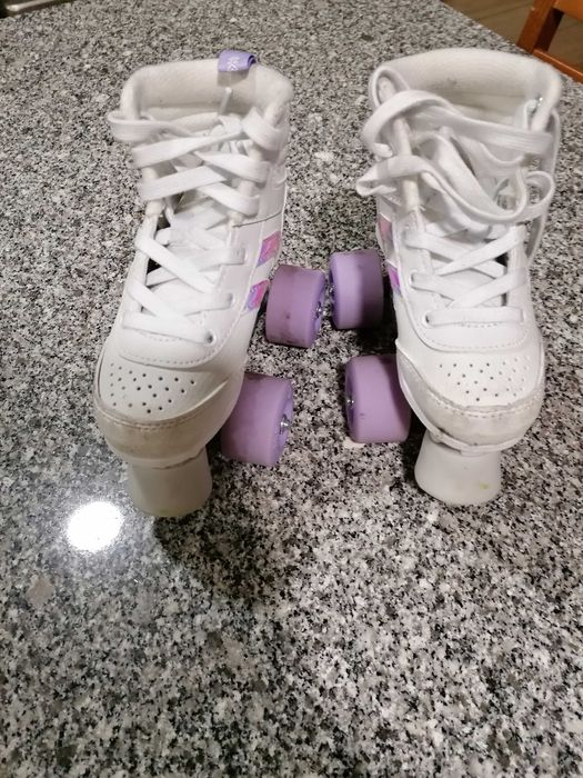 Patins 4 rodas e travões semi novos ( talao de compra de 18/12/25)