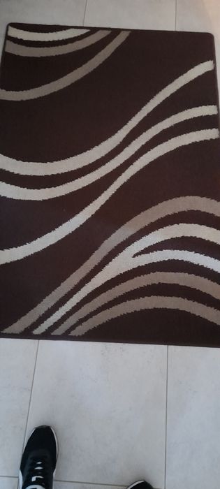 Brown-toned carpet, like new. Size 1.50×1.00.