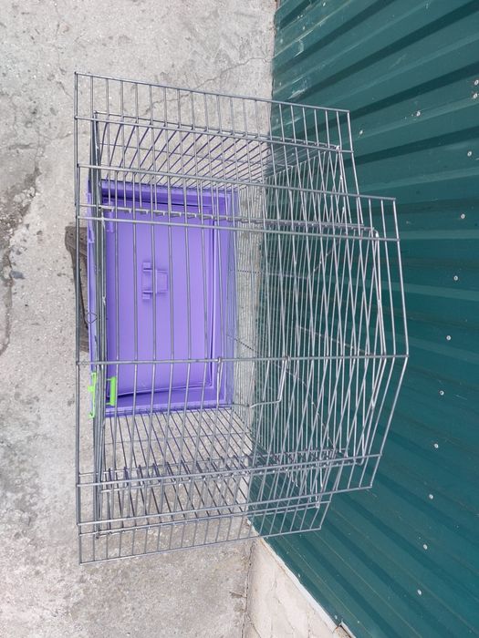 Клітка для папуг велика