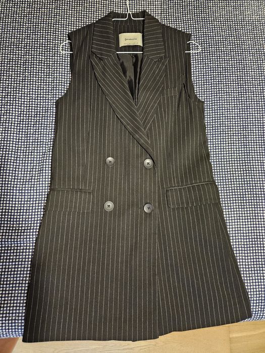 Saia colete, Stradivarius