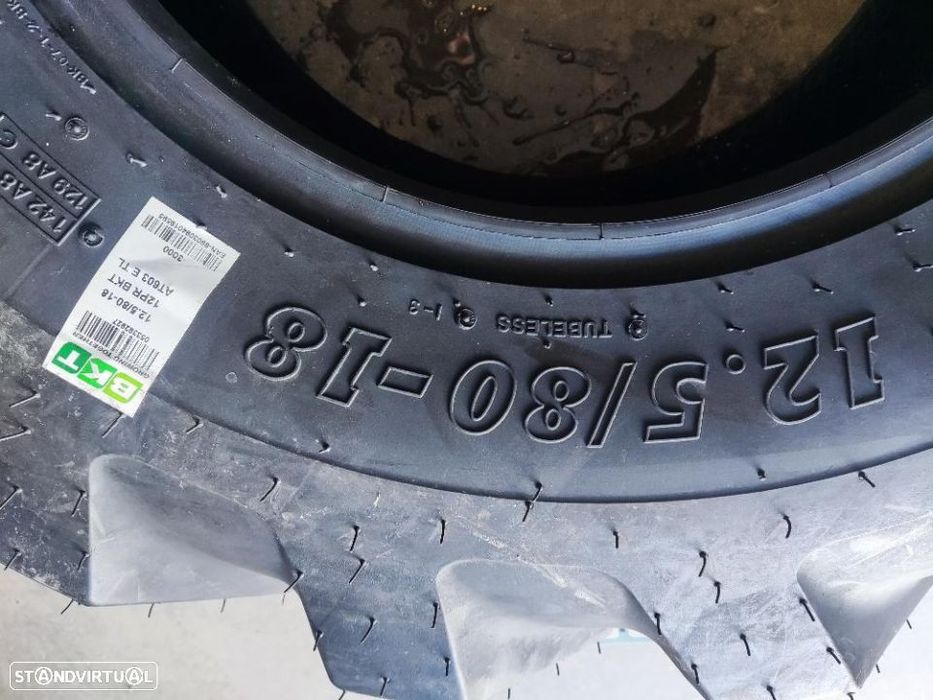 2 pneus novos 12.5/80r18 bkt rectroescavadora - oferta dos portes