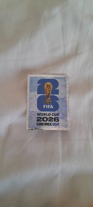 Vendo cromo  Host country emblem  do Mundial 2026