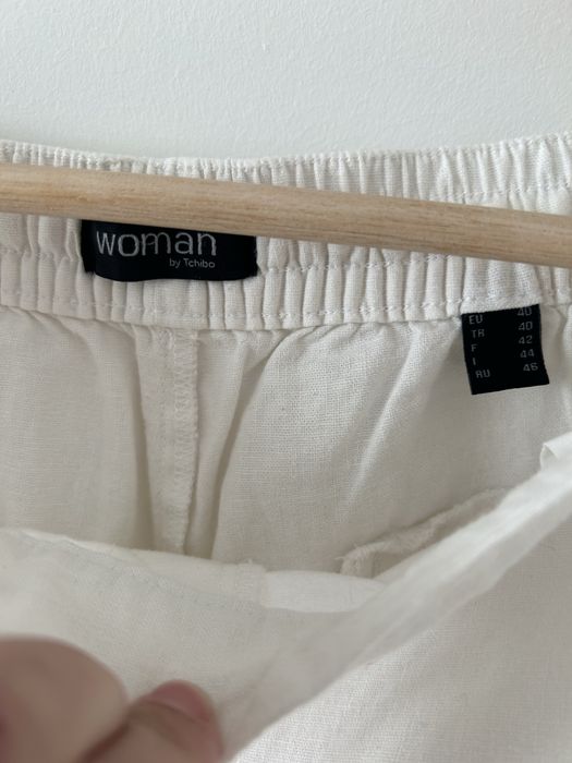 Białe spodnie lnianie Tchibo