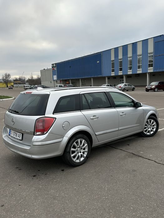 Opel astra h 1.6 бензин