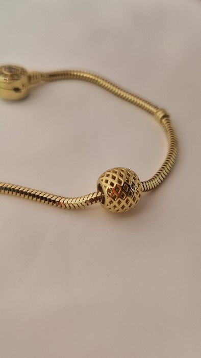 Złoty 585/14k charms ażurowa kulka