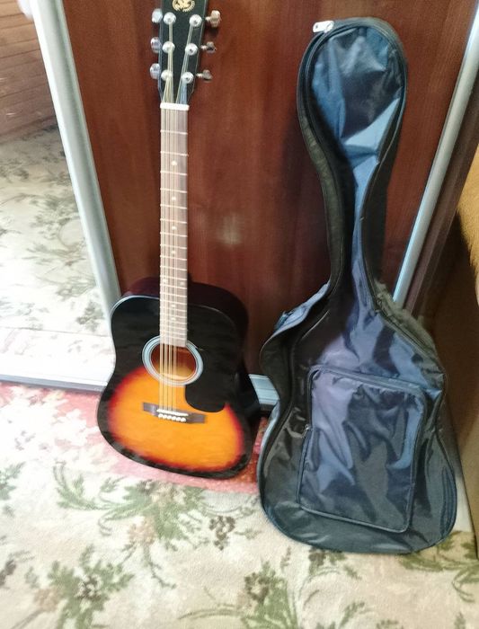 Продам новую акустическую гитару SX