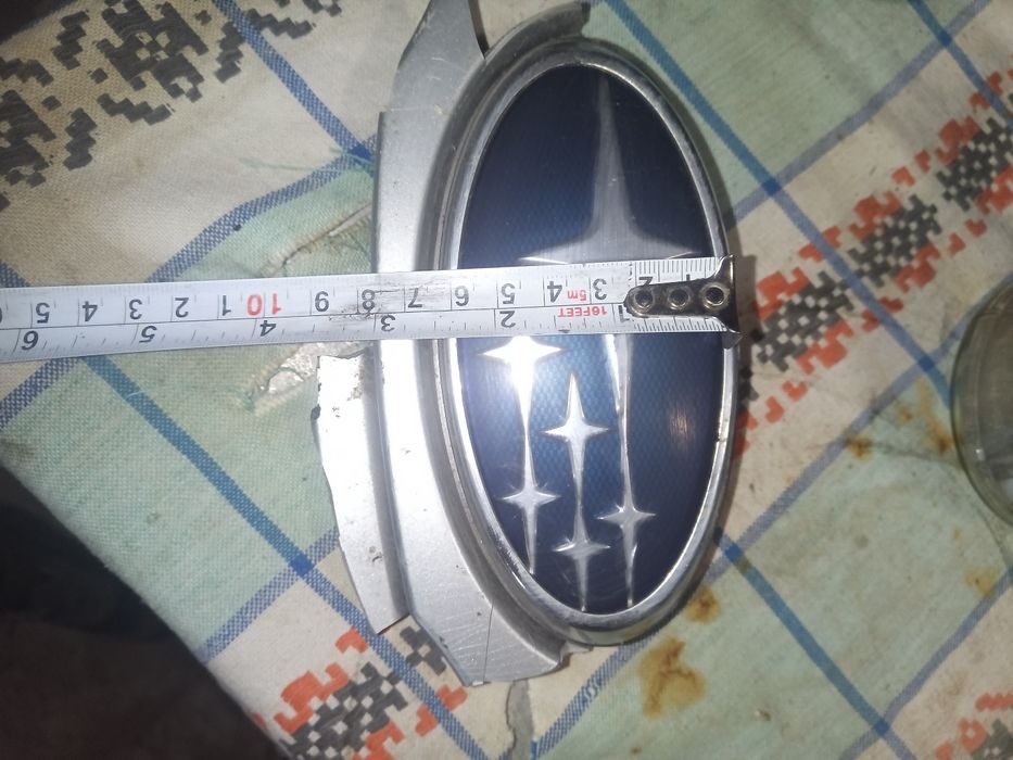 Эмблема Subaru Outback BR