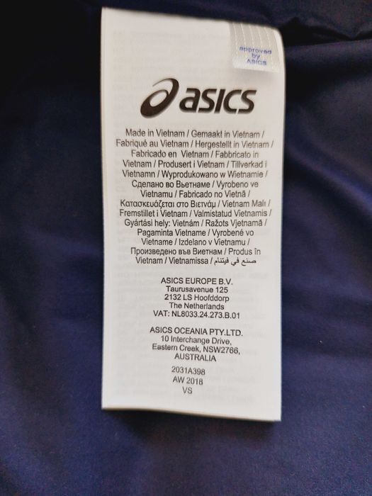 Нова куртка зимова пуховик Asics розмір  L