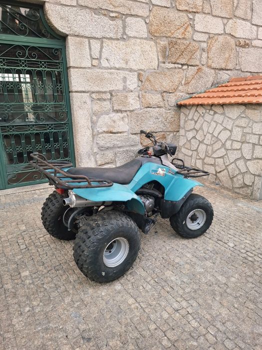 Moto 4 suzuki lt 160  de 1998 a trabalhar