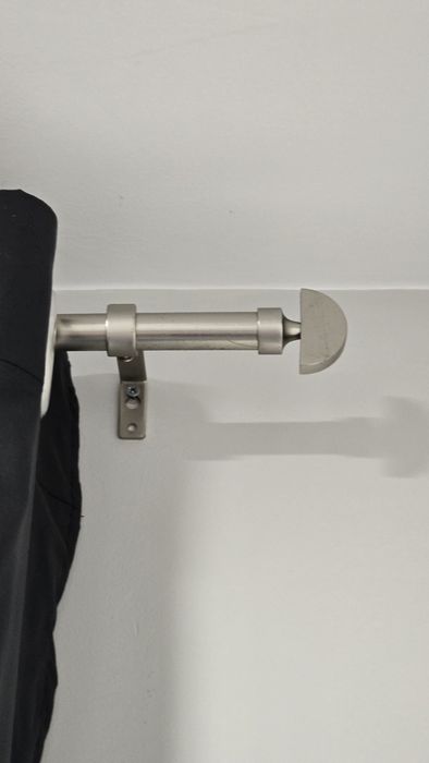 Varão extensível e cortinados