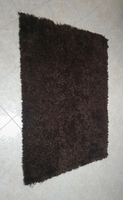 Brown rectangular carpet423322216700334082