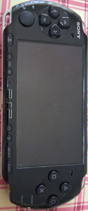 Psp slim com carregador
