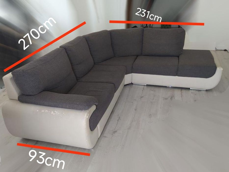 Sofá de canto cinzento e branco