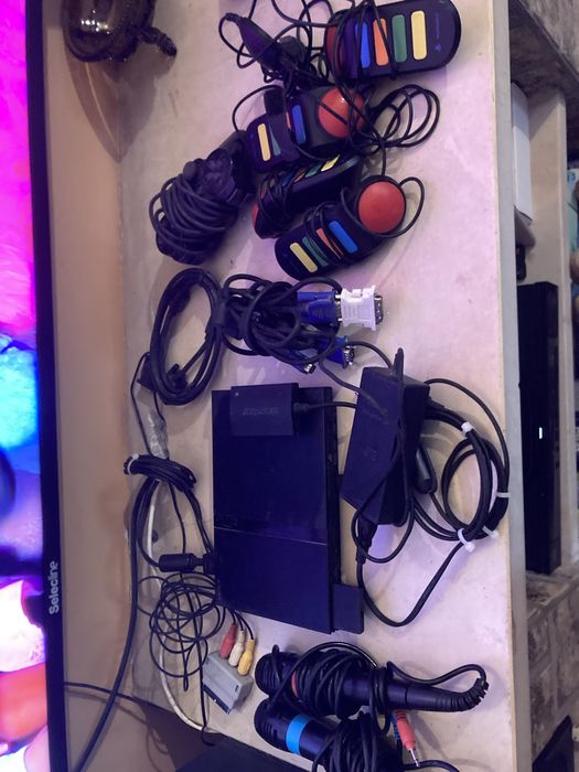 Play Station 2 em bom estado com 4 jogos
