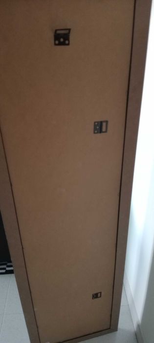 Espelho com moldura maciça