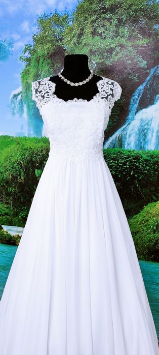 Вісільна сукня ВЕЛИКОГО розміру від 50 - 54  розмір . РОЗПРОДАЖ.