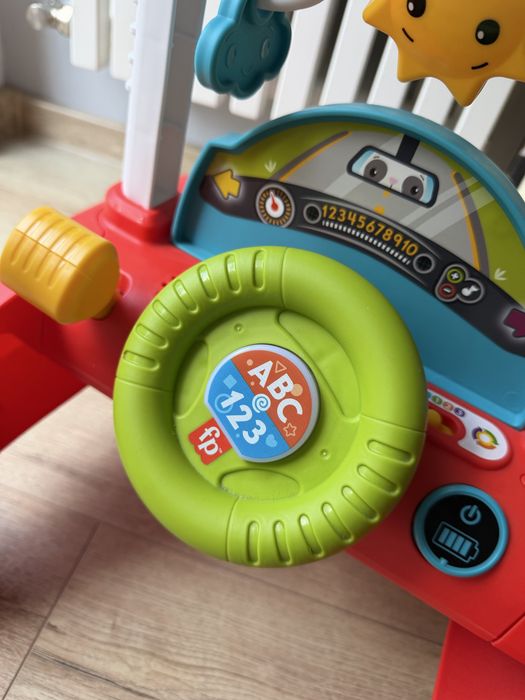 Grający pchacz Fisher Price