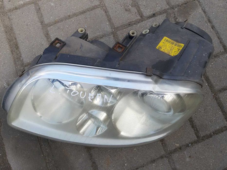 VW Touran 1T reflektor lewy xenon lampa lewy przód