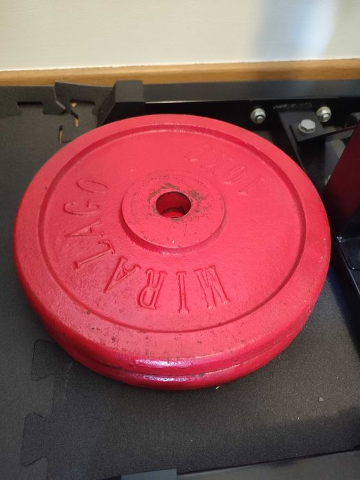 Suportes para barra e pesos de musculação