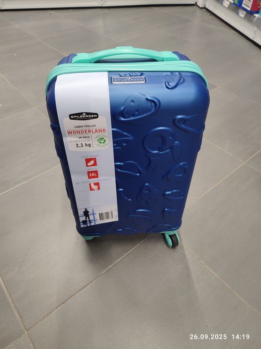 Nowa granatowa walizka podróżna kabinowa