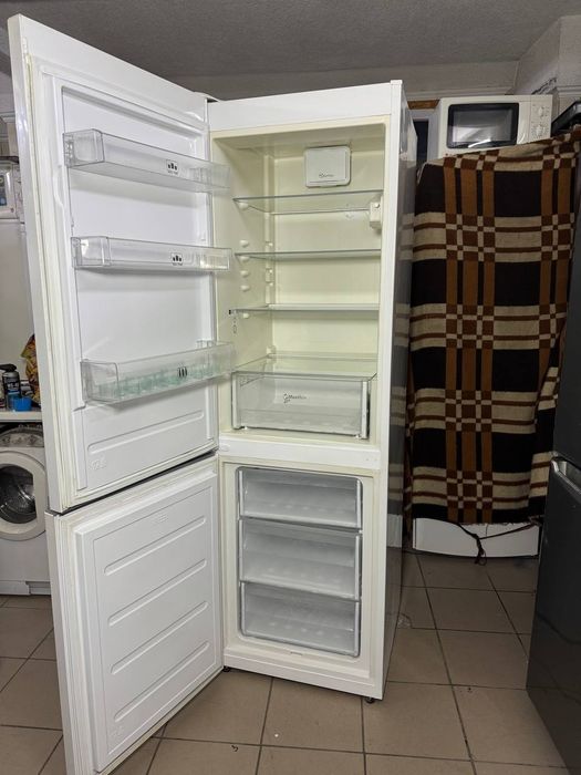 Холодильник з морозилкою Whirlpool