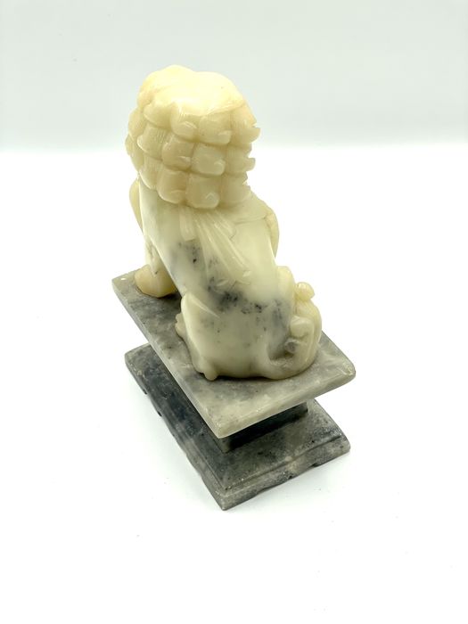 Cao foo em pedra oriental