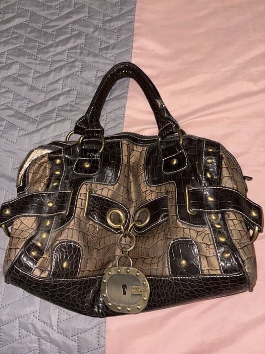 Mala vintage da guess de a muitos anos mas perfeita e nova