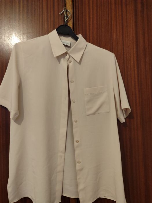 Blusas em segunda mão