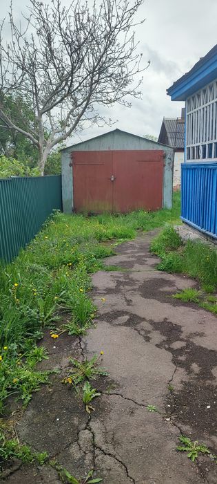 Продам половину будинку в Тетерівці .
