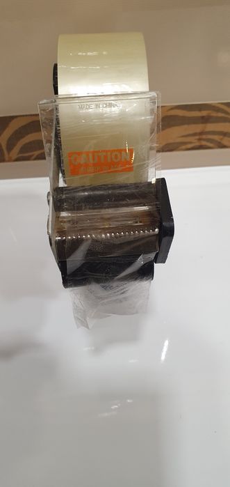 Диспенсер для ураковачного скотча .
