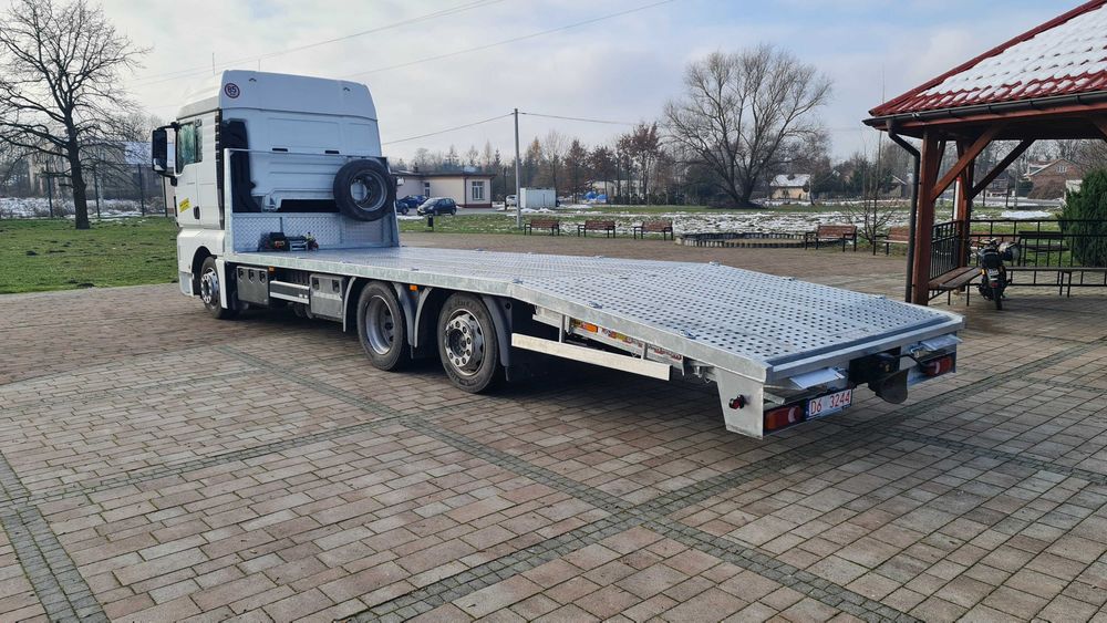 Najazd platforma ciężarowe trzyośka zabudowa laweta MAN TGM Hydraulika