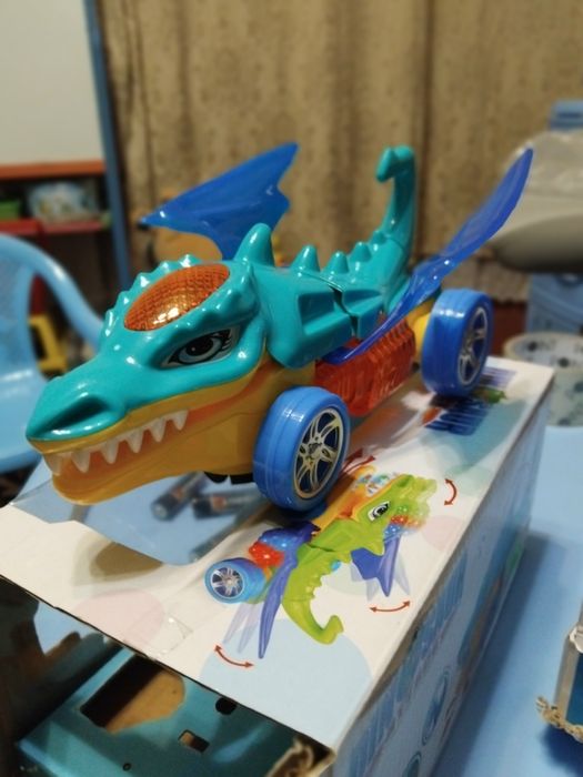 Музикальна машинка дінозавр