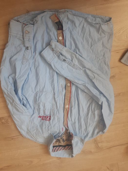 2 koszule błękitne paski 152 oraz 158