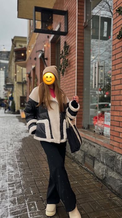 Стильна пухова куртка