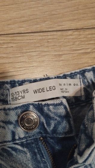 Jeansy  z kokardą rozm 158