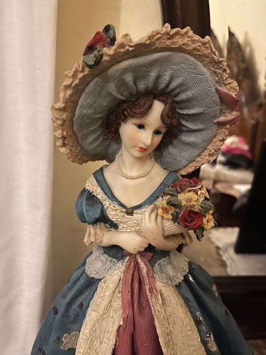 Boneca porcelana como nova