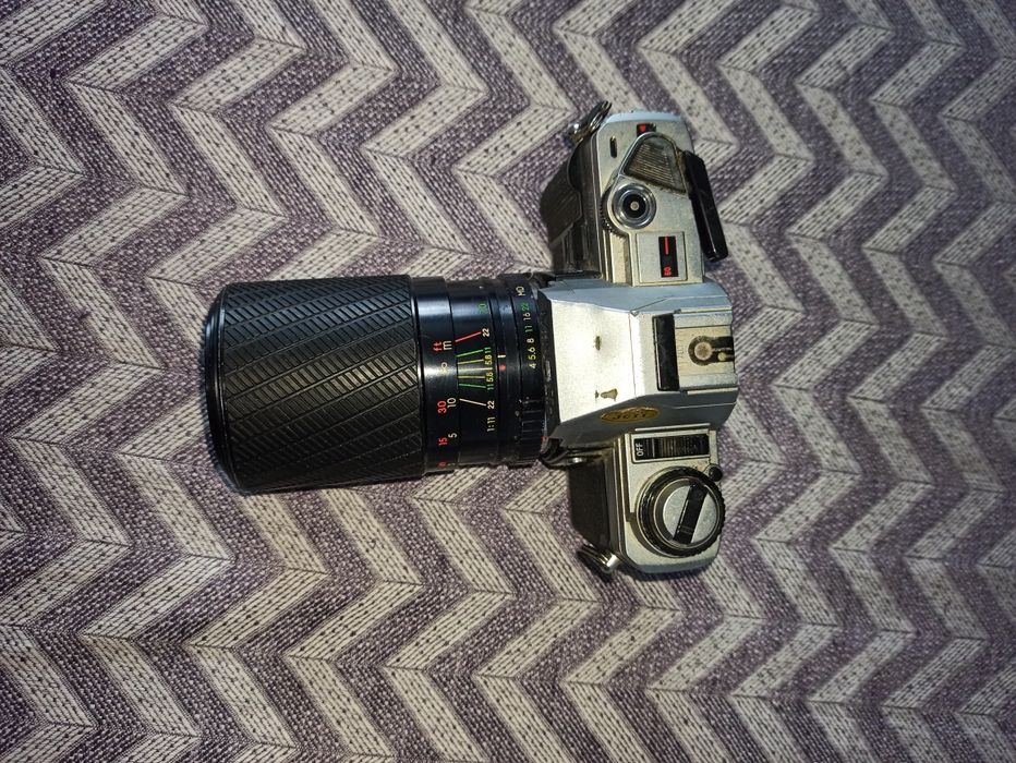Пльоночний фотоапарат minolta x-300 з обьєктивом exakta 70-210