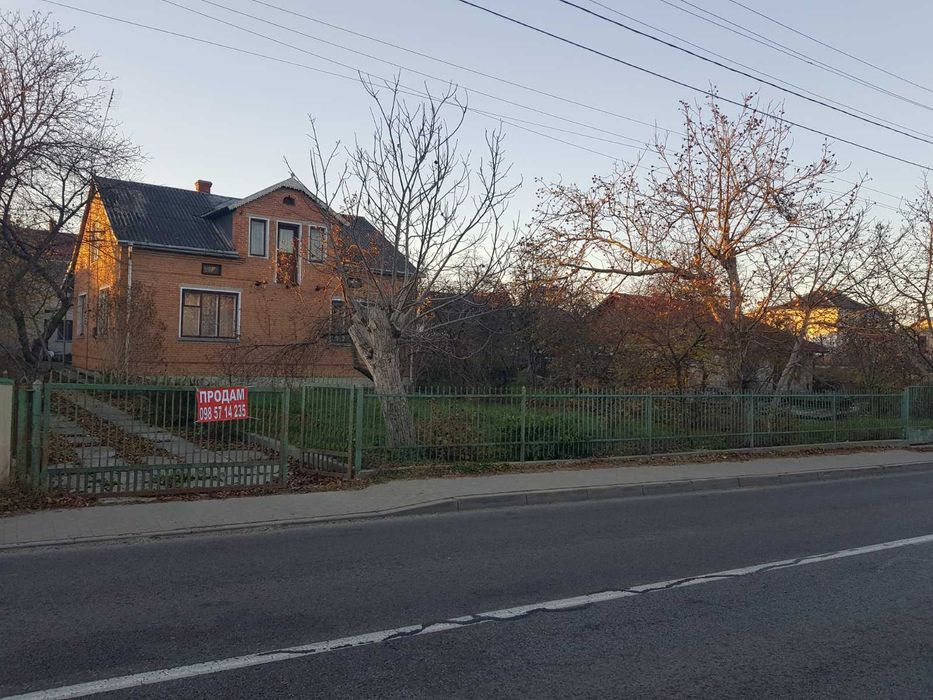 Житловий будинок та земельна ділянка 7,9 сот. м. Кам'янка-Бузька