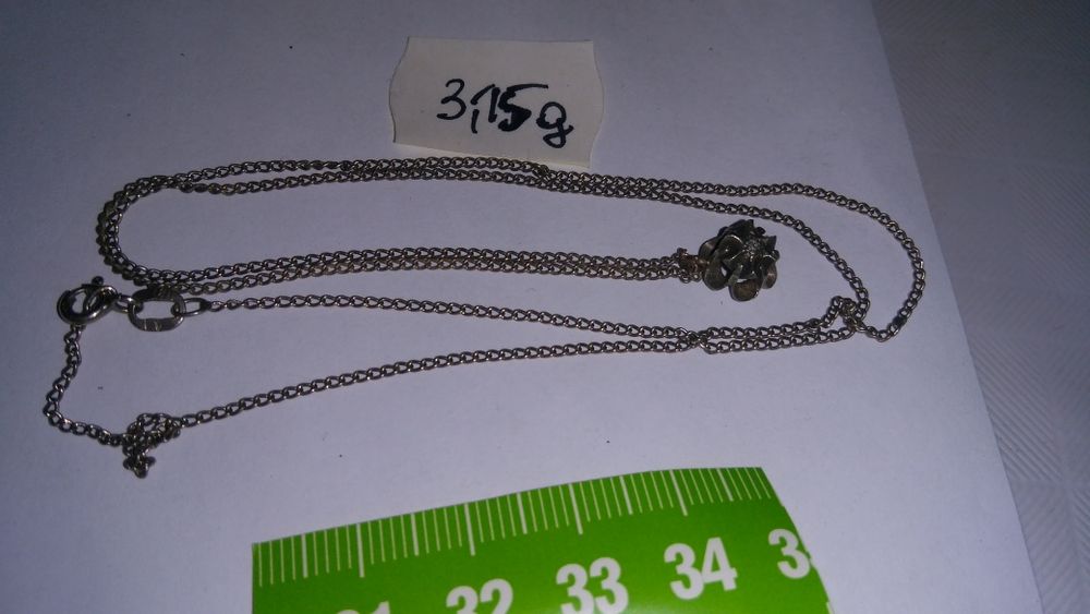 Kolia srebrna z wisiorem z diamentem zamienię