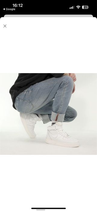 Белые кожаные кроссовки Nike Air Force 1 Mid.