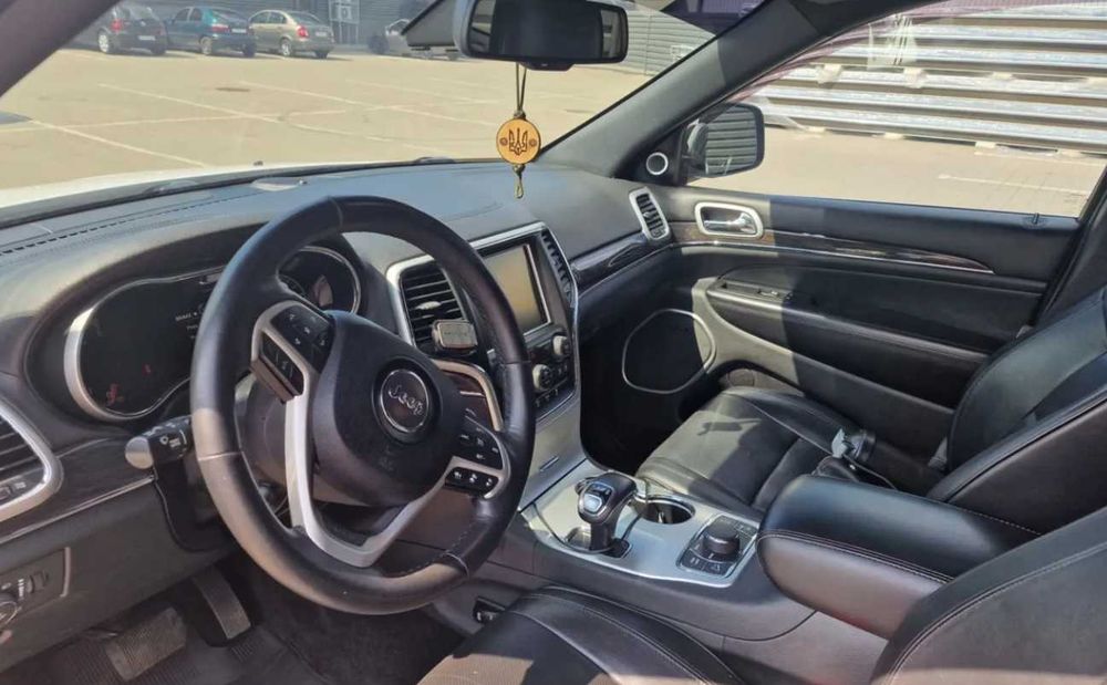 Jeep Grand Cherokee 2015 VIN 1C4RJFCM7FC214884 фото оголошення 11 з 23
