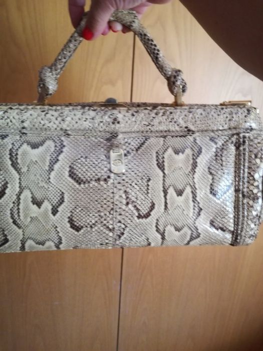 Vendo Mala ou carteira em pele de cobra