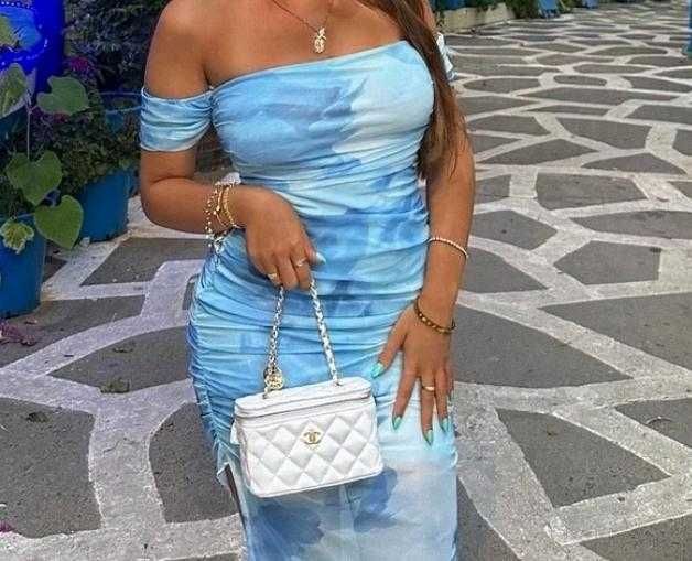 Elegancka sukienka midi z odkrytymi ramionami