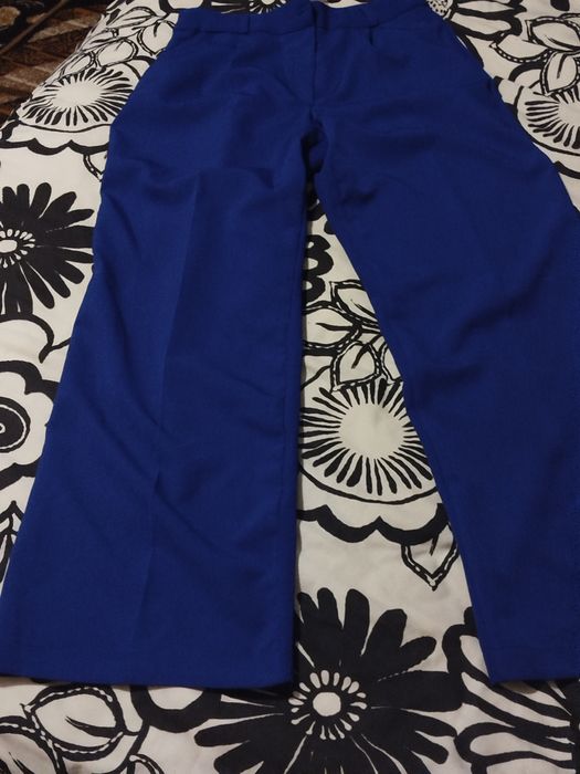 Nowe spodnie niebieskie chabrowe z wysokim stanem 42 XL