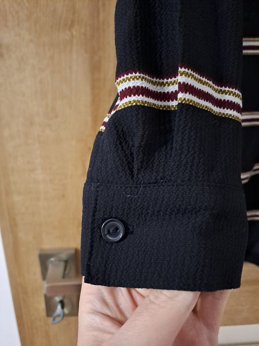 Śliczny elegancki kombinezon w paski rozmiar 36